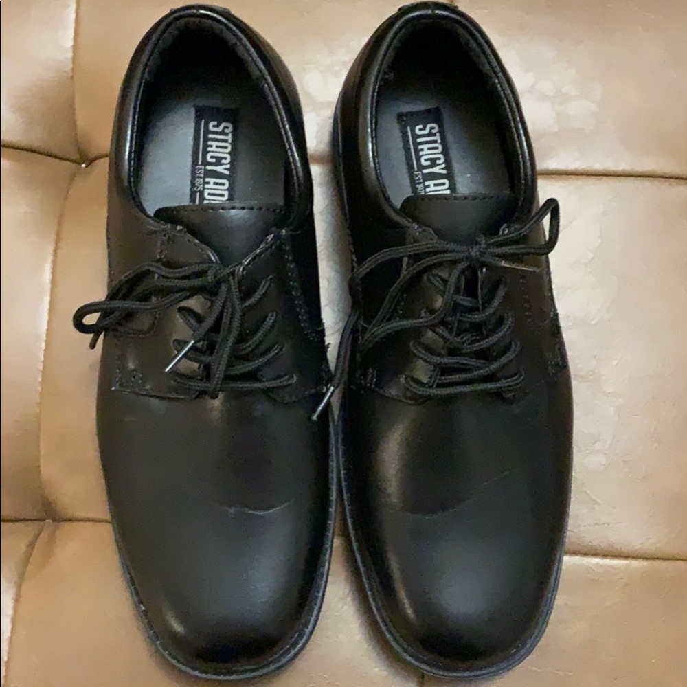 Boys black dress shoes.